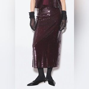 DELUC
DELUC- LOGAN SEQUIN SKIRT | BORDEAUX